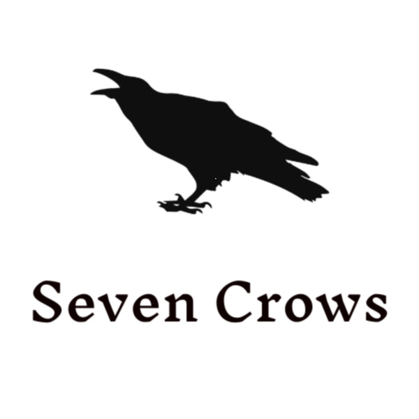 seven crows logo on white background